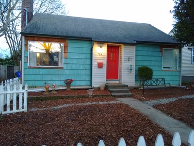 After tearing off vinyl siding and fanfold (except the part around the doorway)